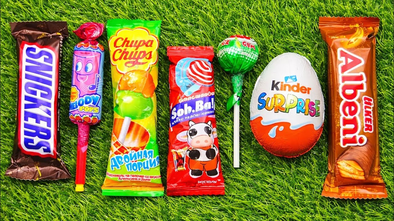 Most Asmr popular candys some lots of colorful rainbow lollipop candy unpacking chocolate eat