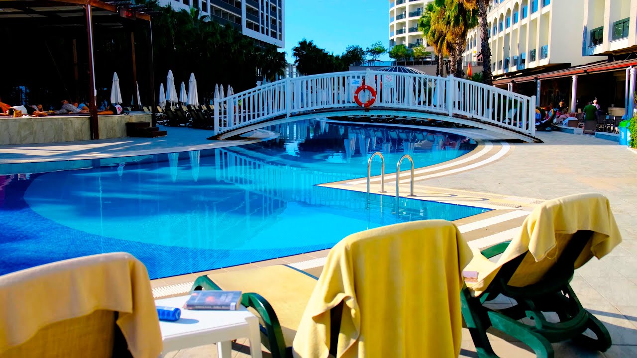 Port River Hotel & Spa 5*. Walking along pool.