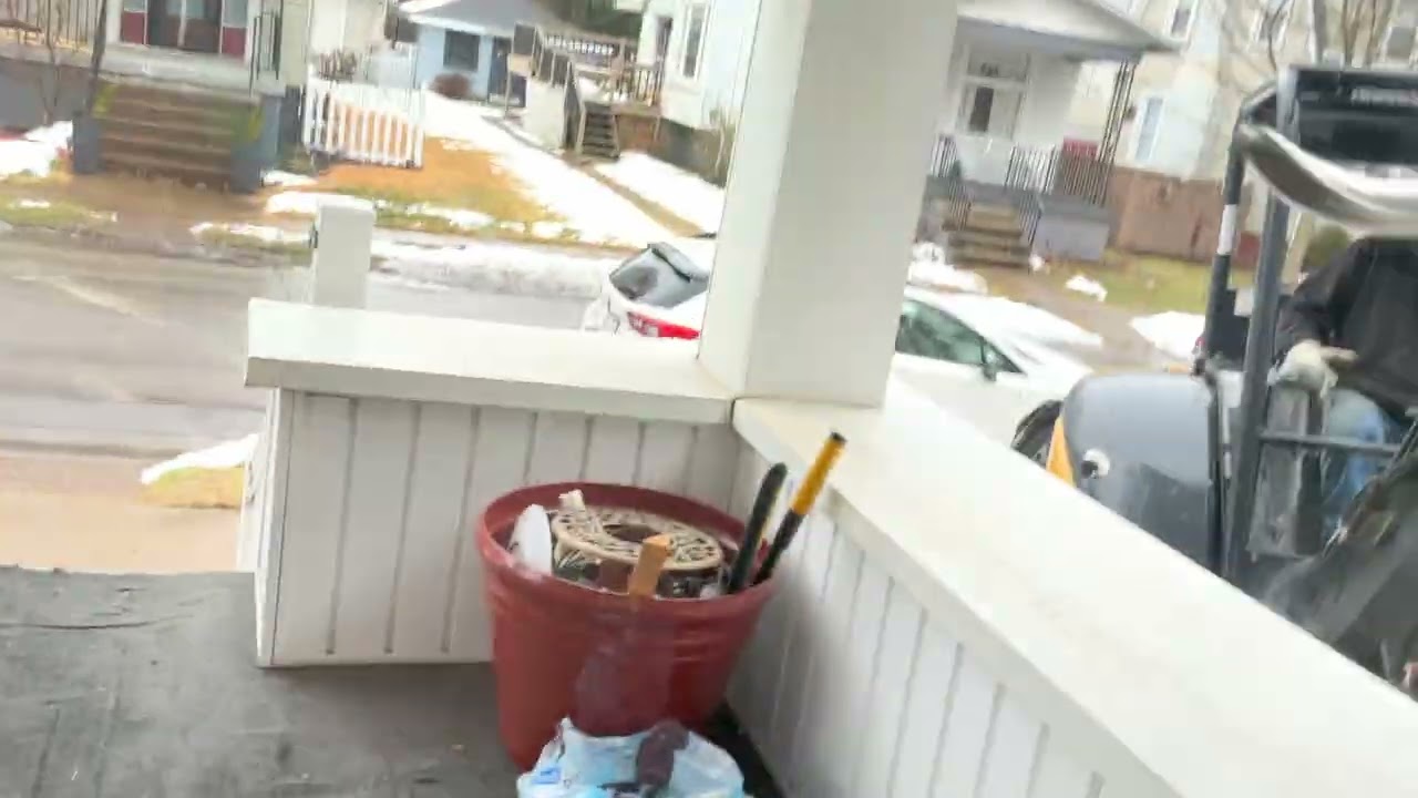 An excavator on the side of our house ￼window POV