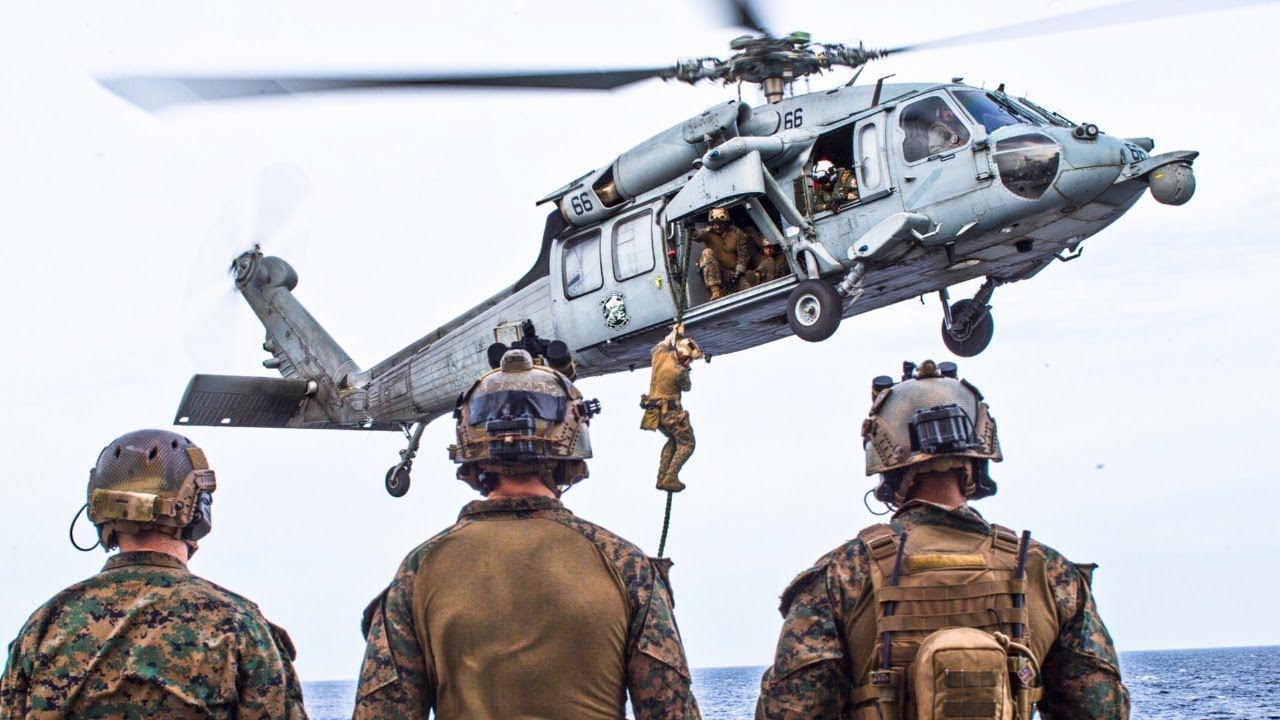 Fast Rope Onto A Ship From A UH-60 Black Hawk helicopter