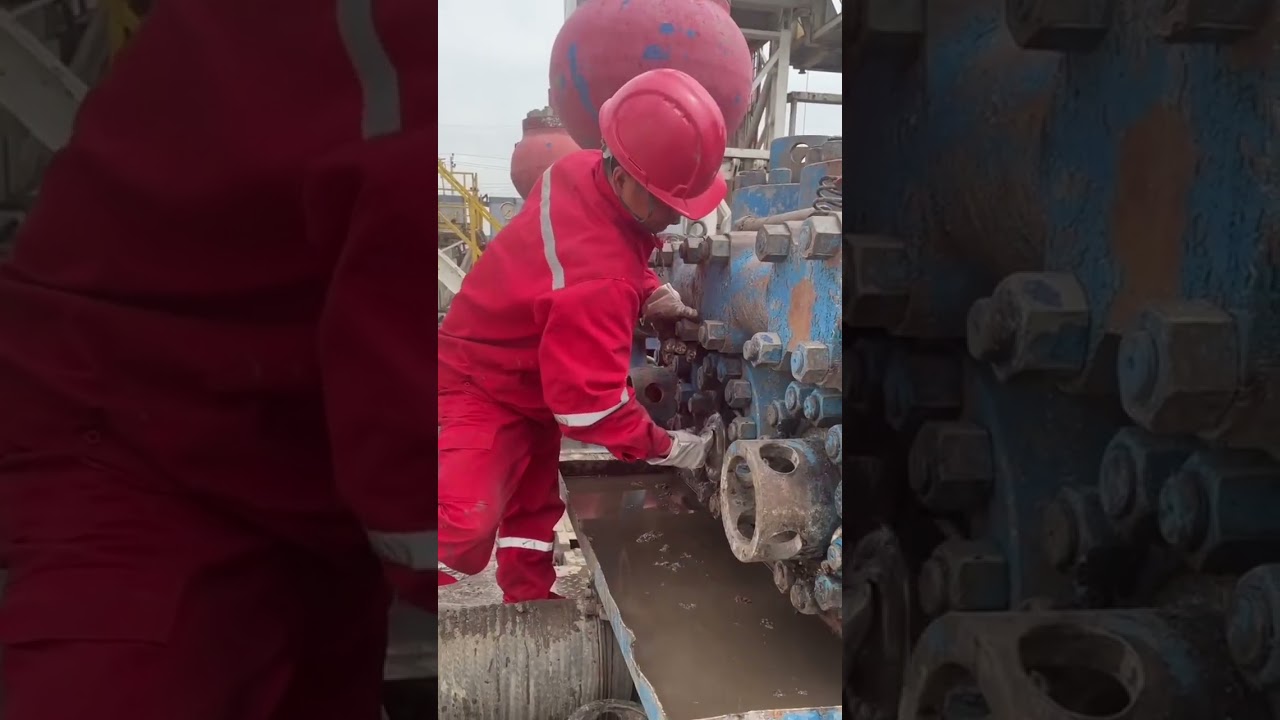 Oil workers perform on-site operations to replace pistons for drilling mud pumps