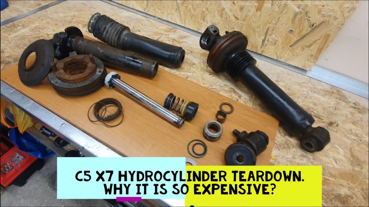C5 X7 Front Hydrocylinder (shock absorber) teardown. See why it is so expensive