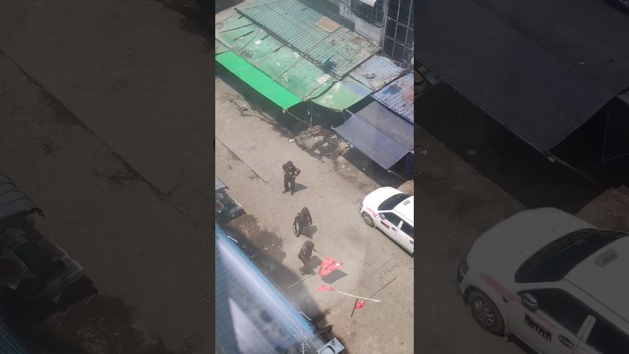 Soldiers Tear Down National League for Democracy Flags in Yangon