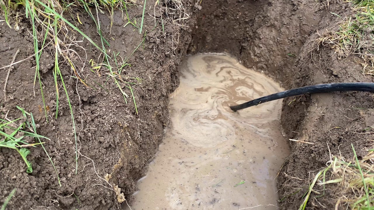 Jetting A Completely Blocked Clay Drain Tile, Finally Found the End