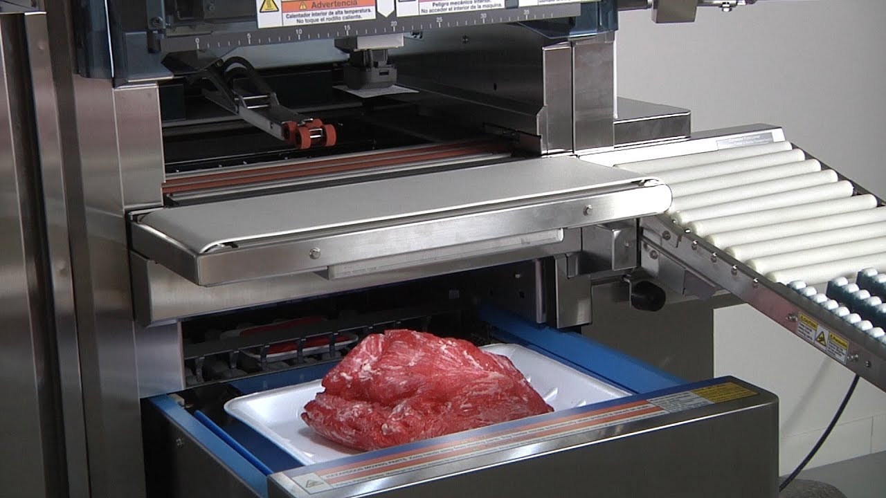 WM-Ai Automatic Wrapper with Day Glow Labeler Sales Video