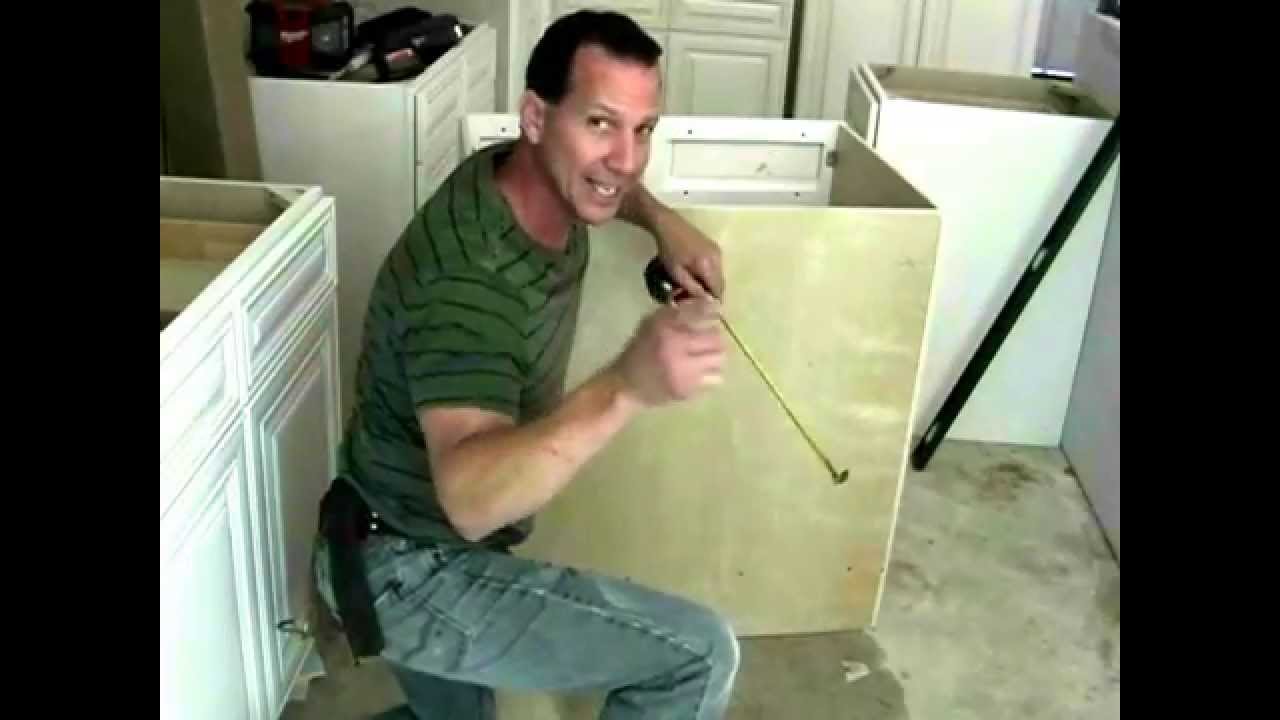 Installing your sink base cabinet( Cutting Holes For Plumbing)