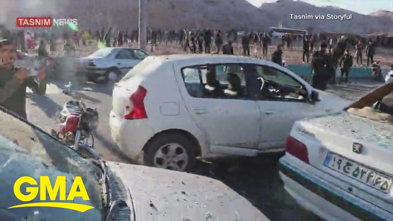 Twin blasts kill nearly 100 in Iran