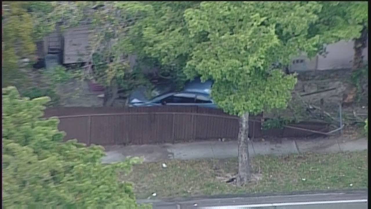 Car crashes into fence