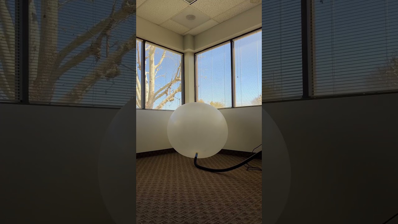 Inflating a weather balloon inside 🎈 #balloon #balloonpop
