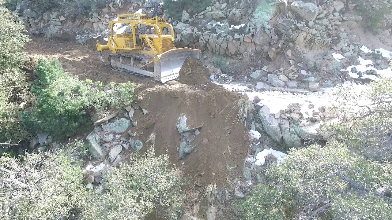 Cat D7E road maintenance in southern Arizona.