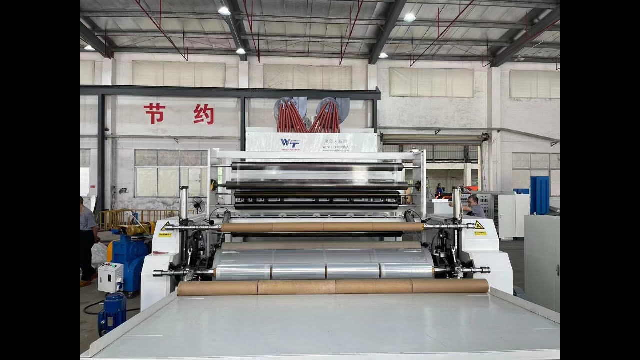 Fully automatic high speed jumbo roll stretch film making machine