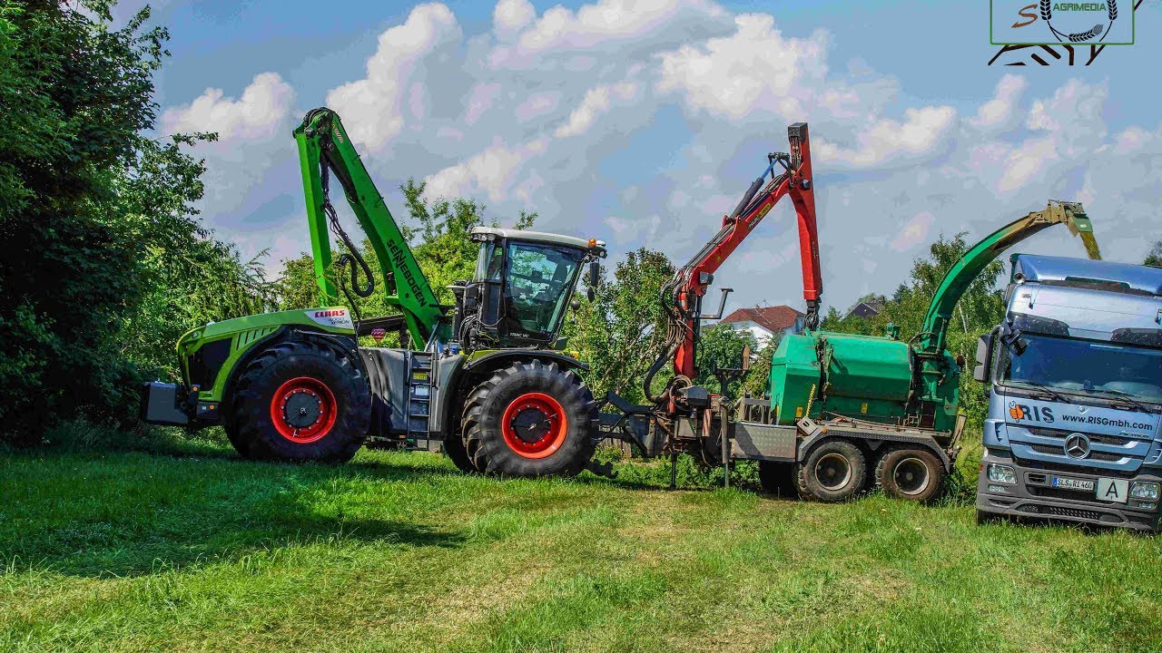 Claas Xerion 4000 TracVC mit Jenz HEM 582Z und Sennebogen 718 am Holzhacken