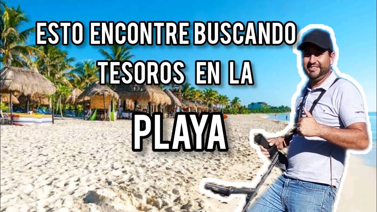 Detectando en la playa buscando tesoros