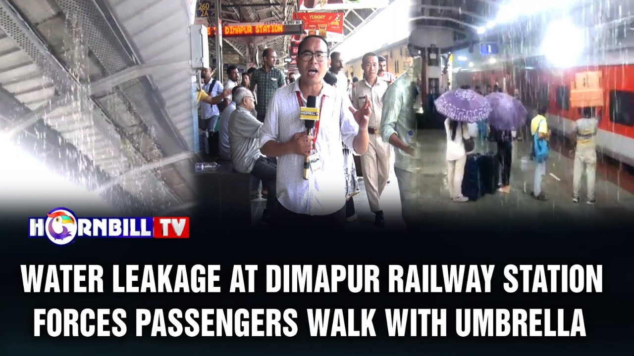 WATER LEAKAGE AT DIMAPUR RAILWAY STATION FORCEs PASSENGERS WALK WITH UMBRELLA