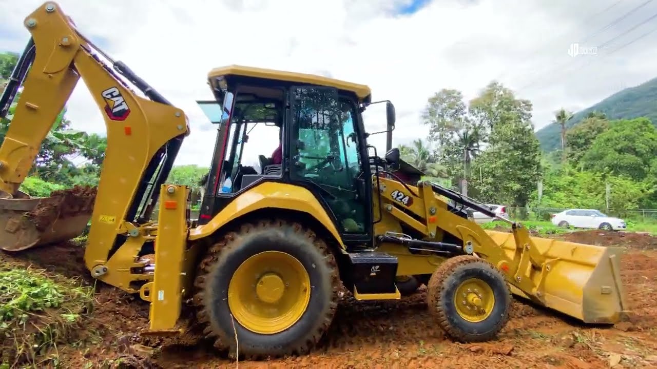 cat 424 backhoe leveling land .... #jcb  #cat 424 #backhoe
