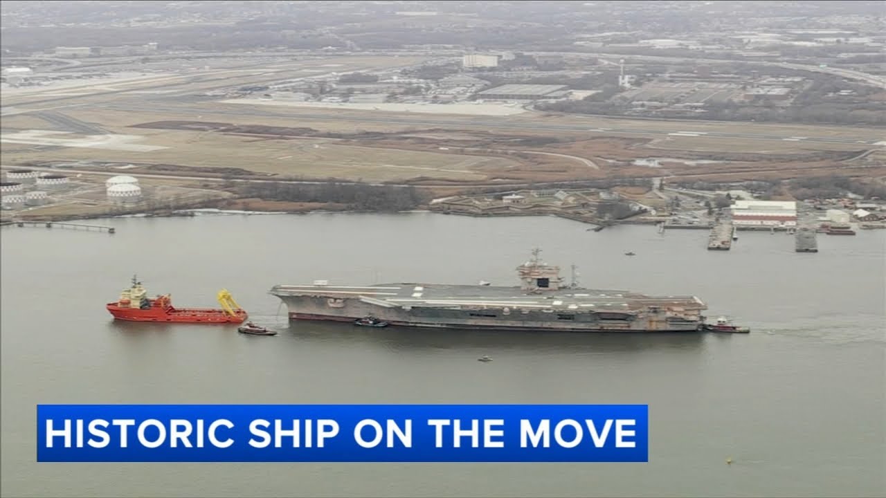 Former USS JFK towed down Delaware River as aircraft carrier begins journey out of Philadelphia
