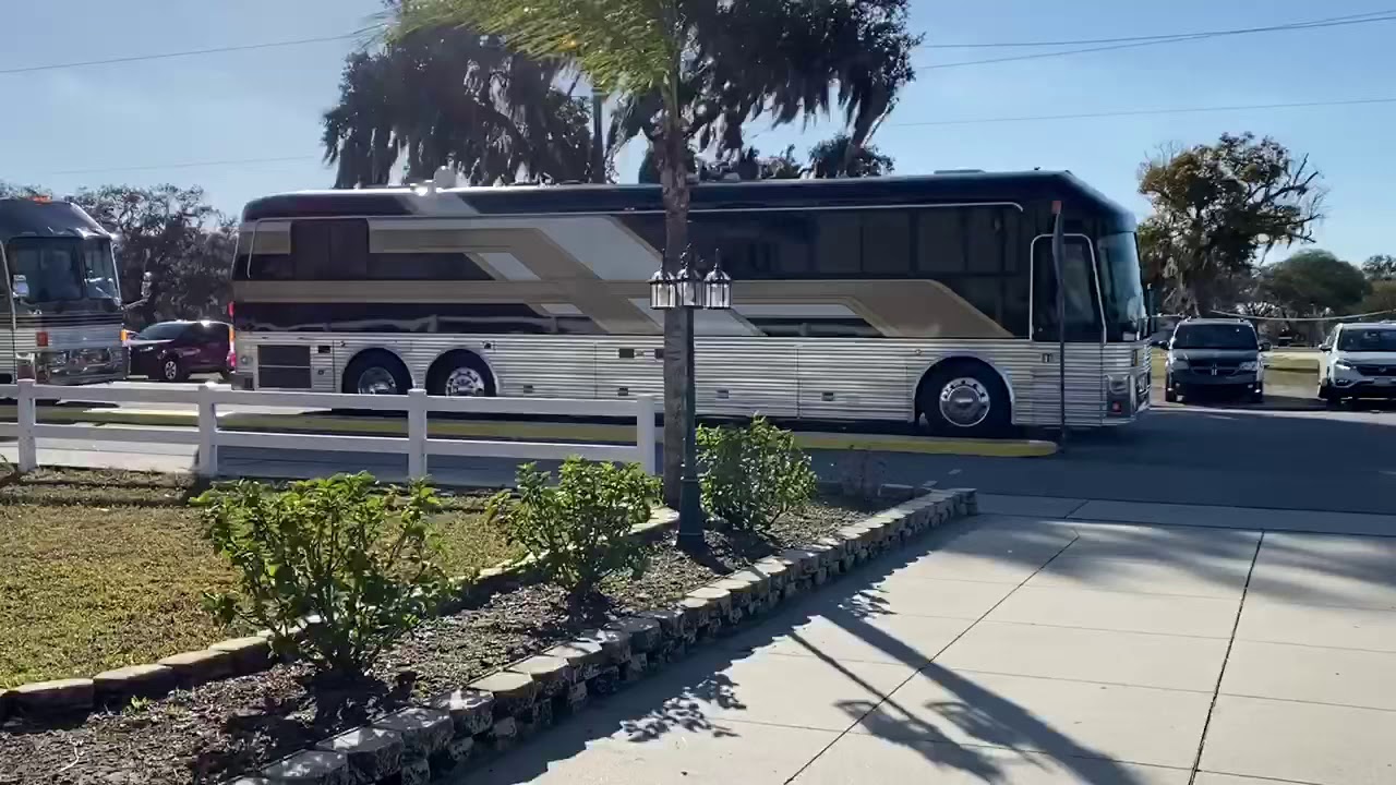 Two Silver Eagle Buses pulling in..