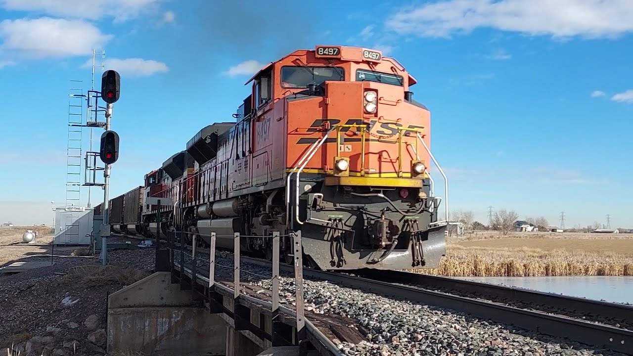 BNSF8497 Lead a coal train off a siding on the Brush