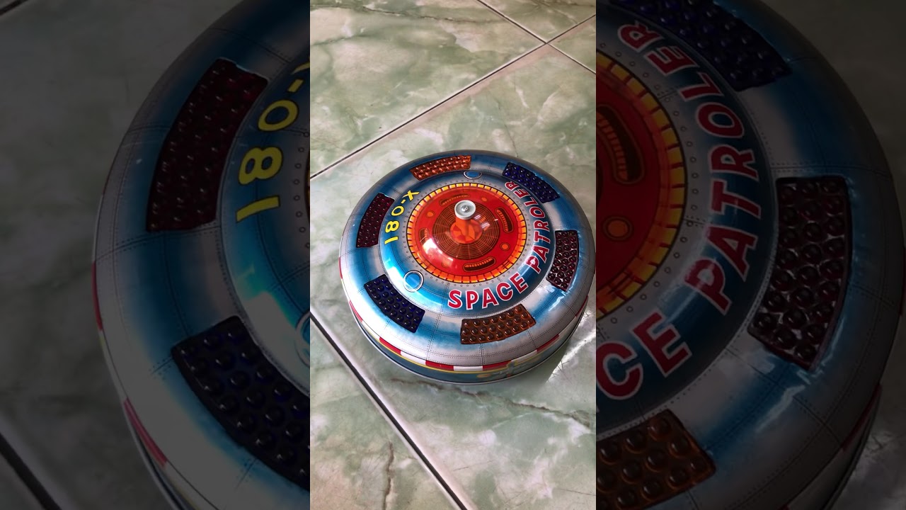 Vintage King Flying Saucer tin toy