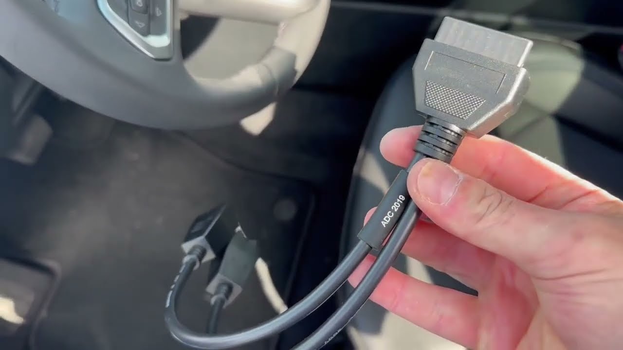 2024 Jeep Compass Installing the ADC-2019 cable into the SGM