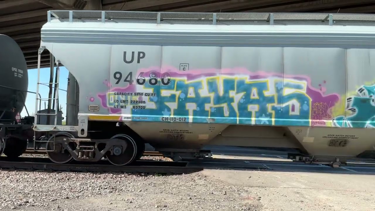 UP 6211 EX SP leads a manifest train with damaged train flatcars in Houston TX!!!