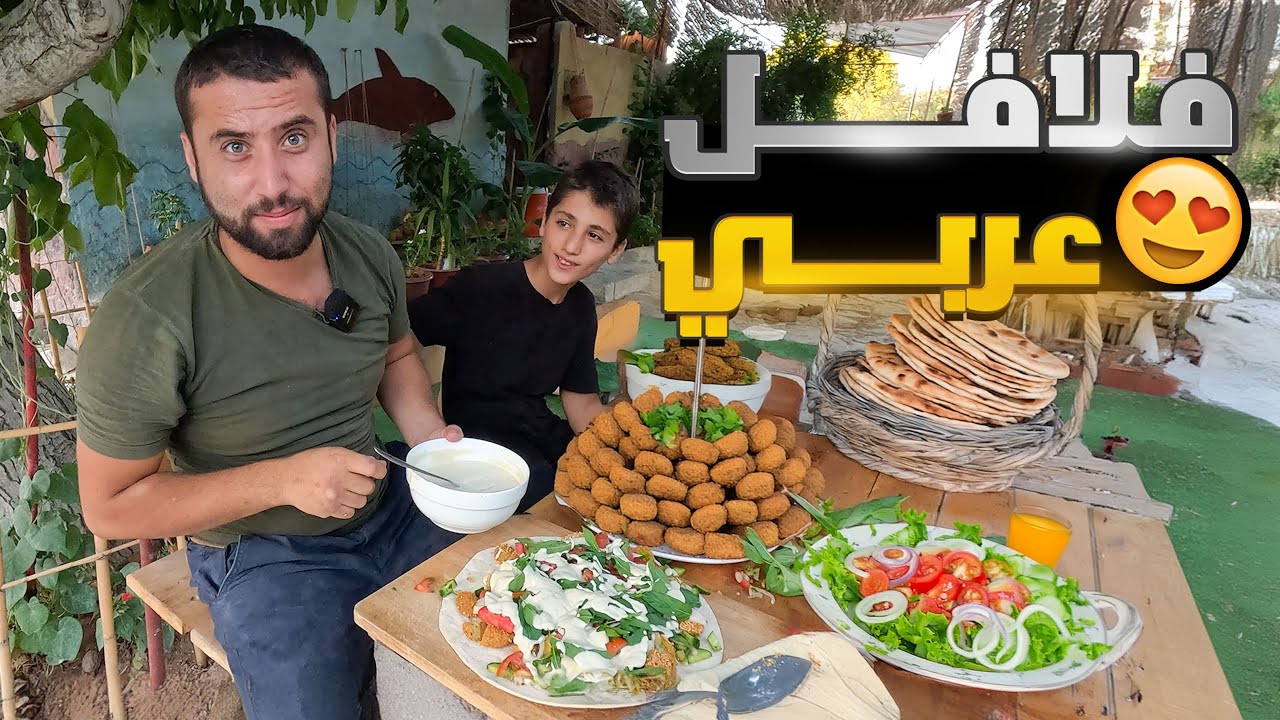 جهزت اطيب واكبر صندويش فلافل عربي و تحديت ابوي مين بخلصها والنهاية غير متوقعة ؟؟