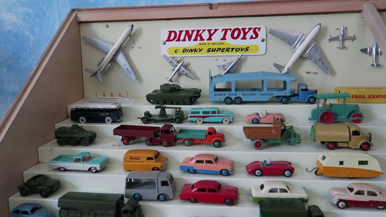 Old Canadian  Dinky Toy store display with some toys in place