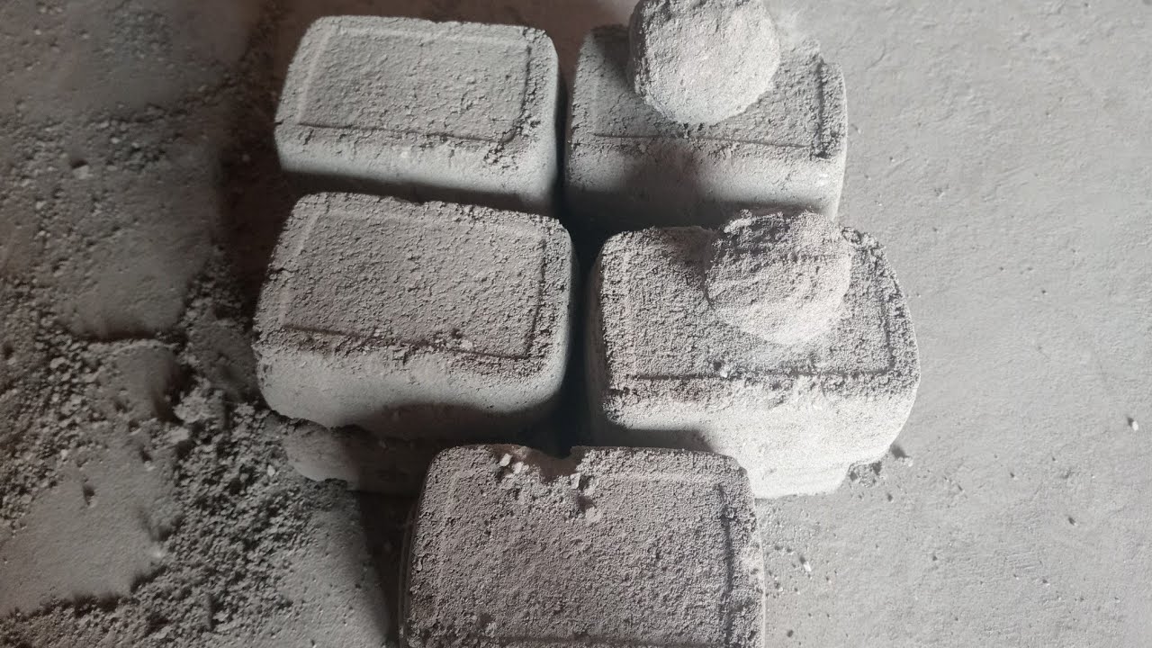 New video of crunchy crispy white concrete sand cement crumbling dry on floor and water with dipping