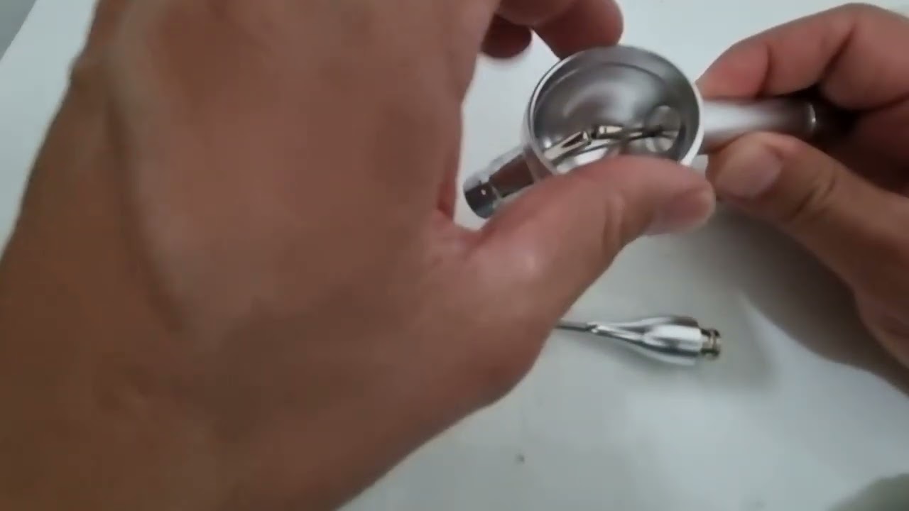 Limpeza de caneta de jato de bicarbonato odontológico