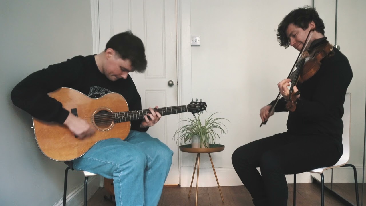 Pro Guitarist Accompanies Melodies He's Never Heard Before