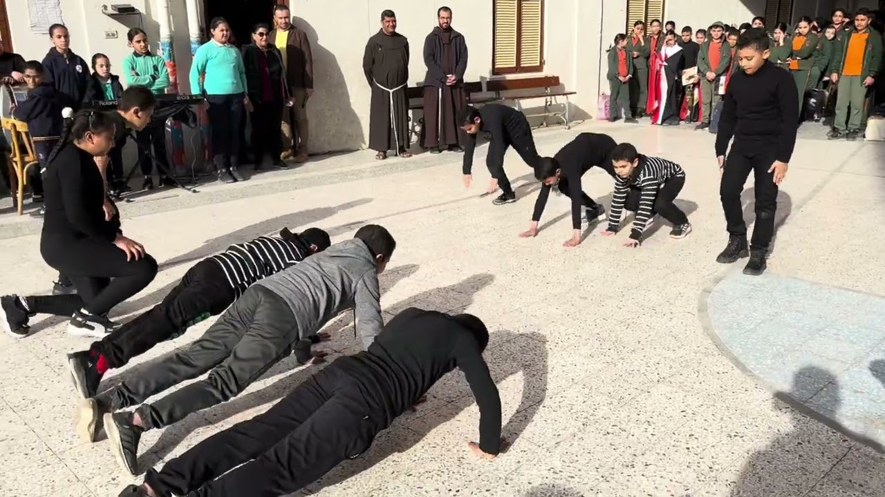علمونا في مدرستنا استعراض رياضي - كارتية بمناسة عيد الشهيد