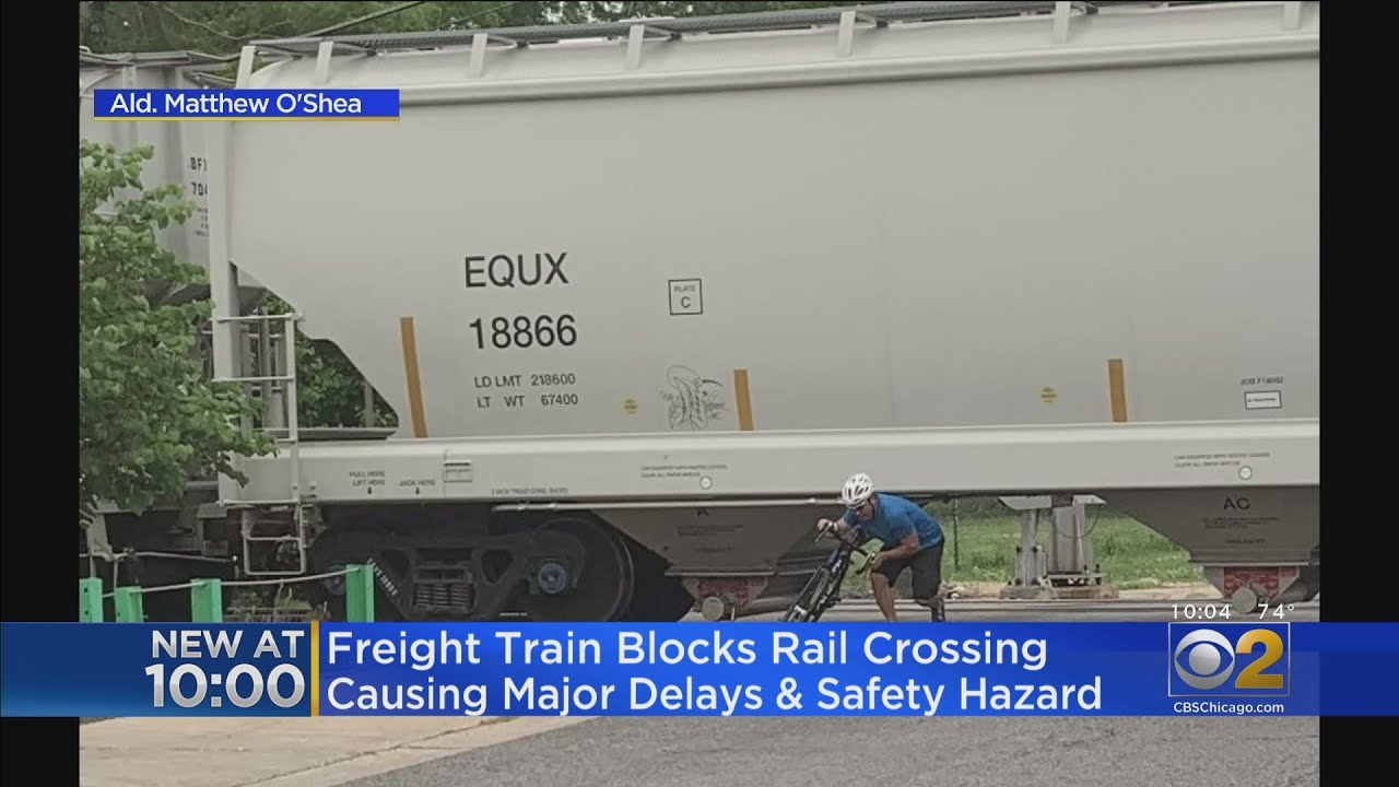 Freight Train Blocks Rail Crossing On Southwest Side, Causing Major Delays And Safety Hazard