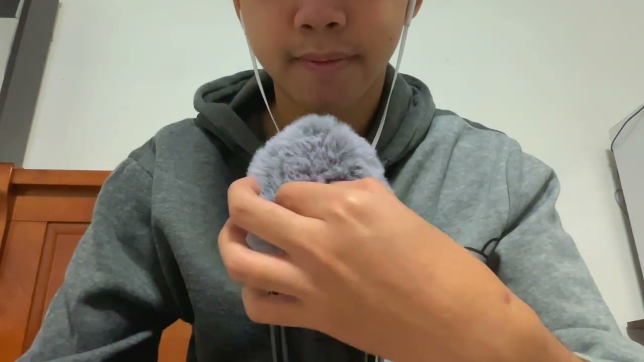 ASMR plucking the fluffy mic until 100