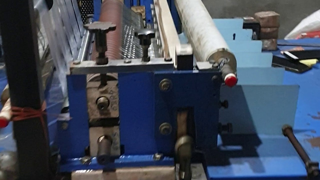 DOUBLE DECKER HIGH SPEED BOTTOM SEALING AND CUTTING MACHINE WITH SERVO(1)