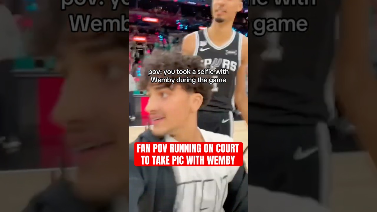 POV of fan running on court to take selfie with Wemby 😅