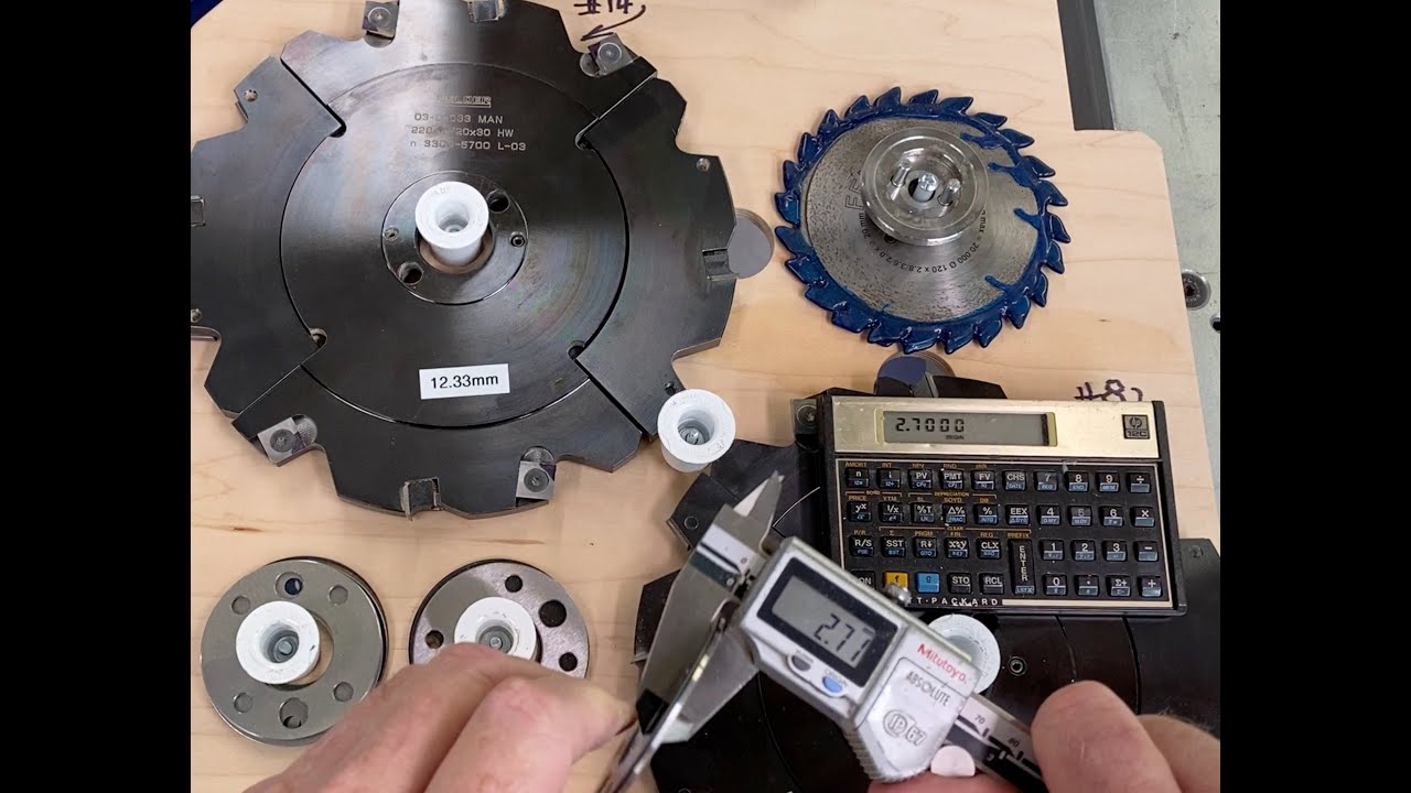 Configuring cutting width of a two-piece dado or grooving cutter.