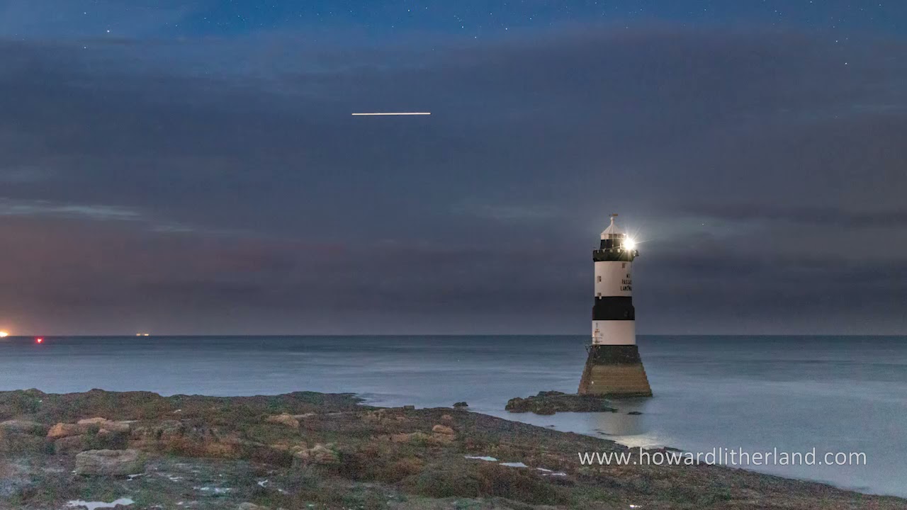 Time lapse of nightfall over Penmon Point lighthouse, Anglesey, North Wales