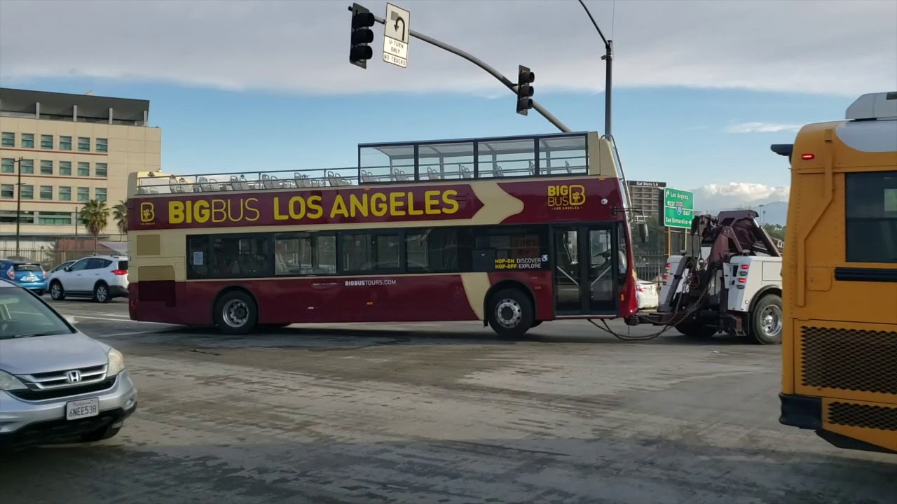 City Terrace towing a double decker bus