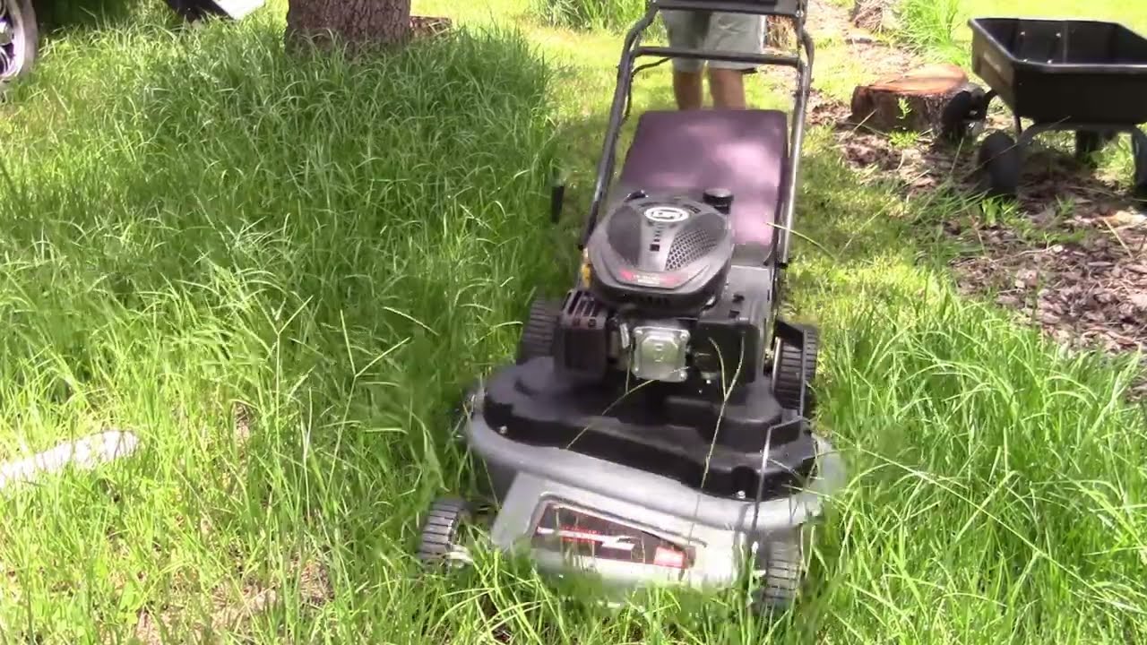 DR 30 inch mower bagging some tall grass DR Power PRO MAX30