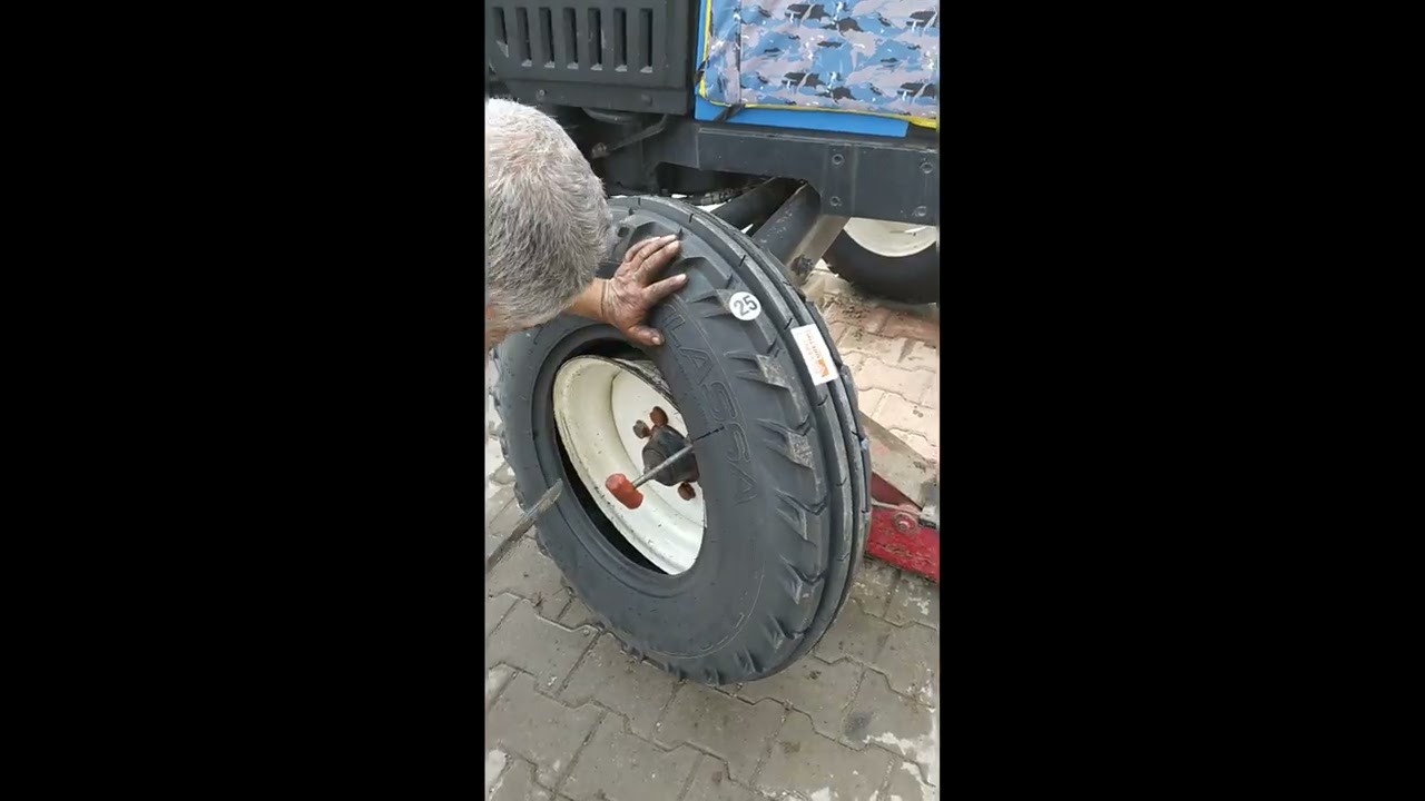 TIRAKTÖR LASTİK DEGİŞİMİ KAZMA VE LEVYE İLE