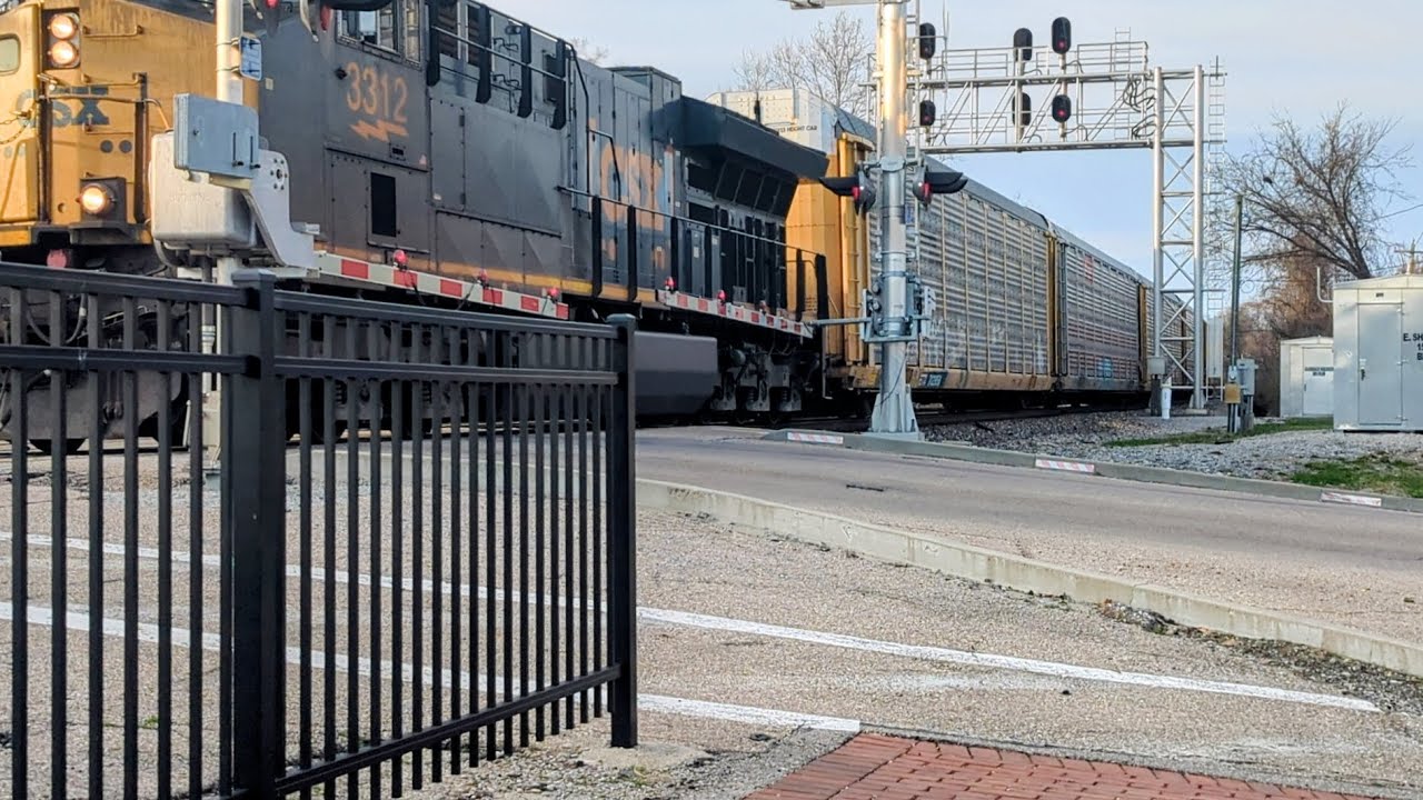 Southbound CSX M277 autorack with mid-train DPU on track two 