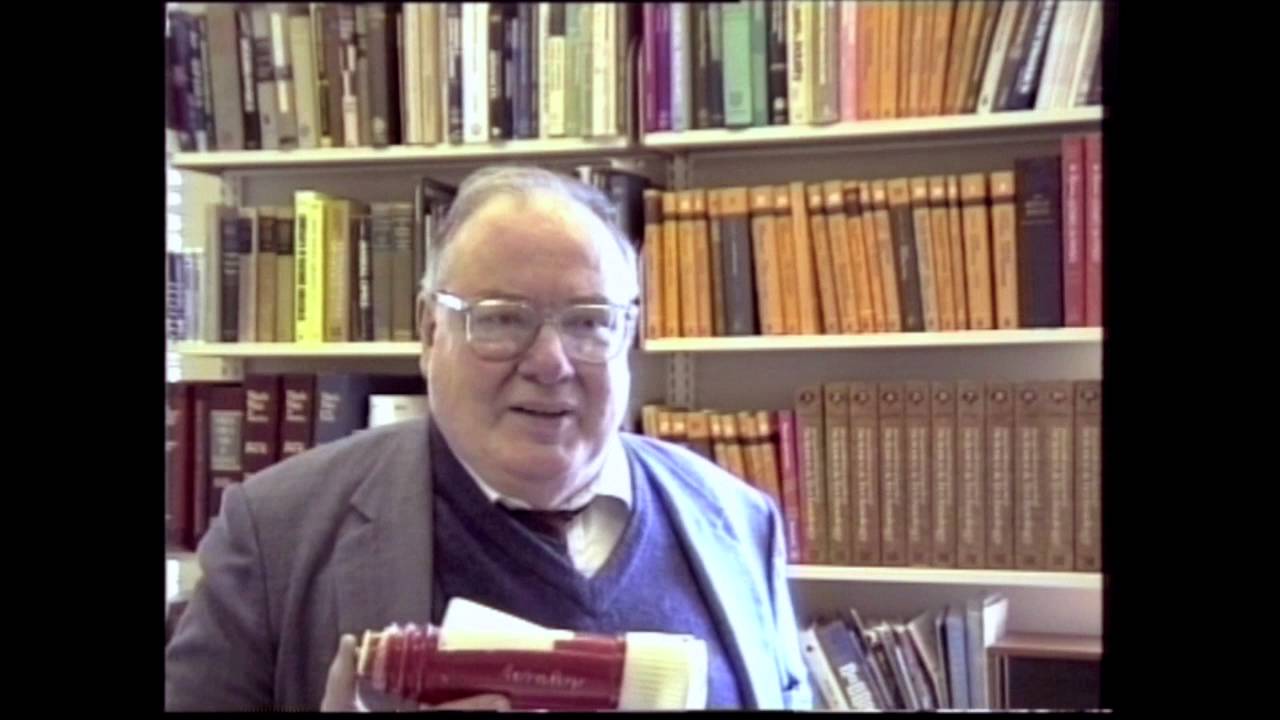 Arthur Schawlow pops a balloon