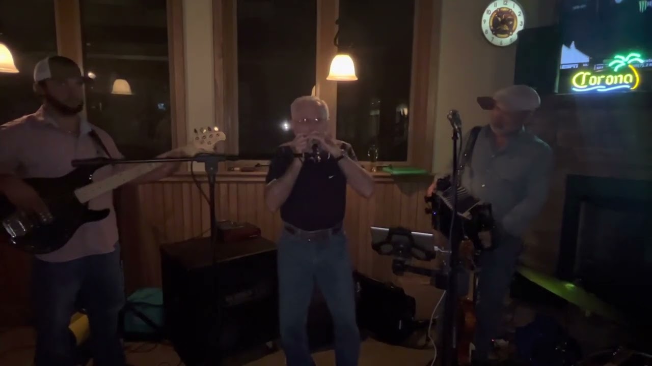 Cajun music at its best - Chris Miller and Cajun harmonica legend Jerry Devillier