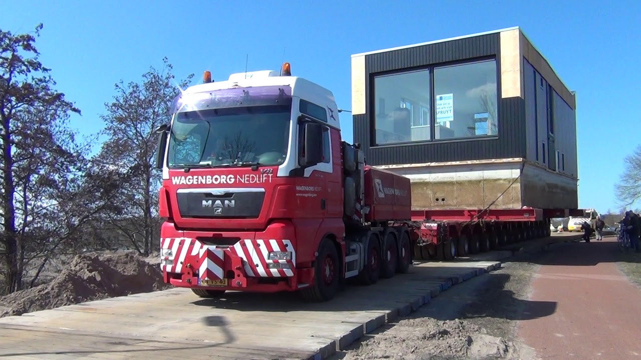 Vervoer waterwoning over de weg