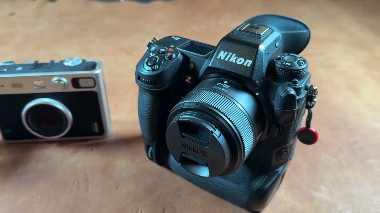 Which one of these cameras is the better camera?  Leica M3, Fuji Instax mini evo, Nikon Z9