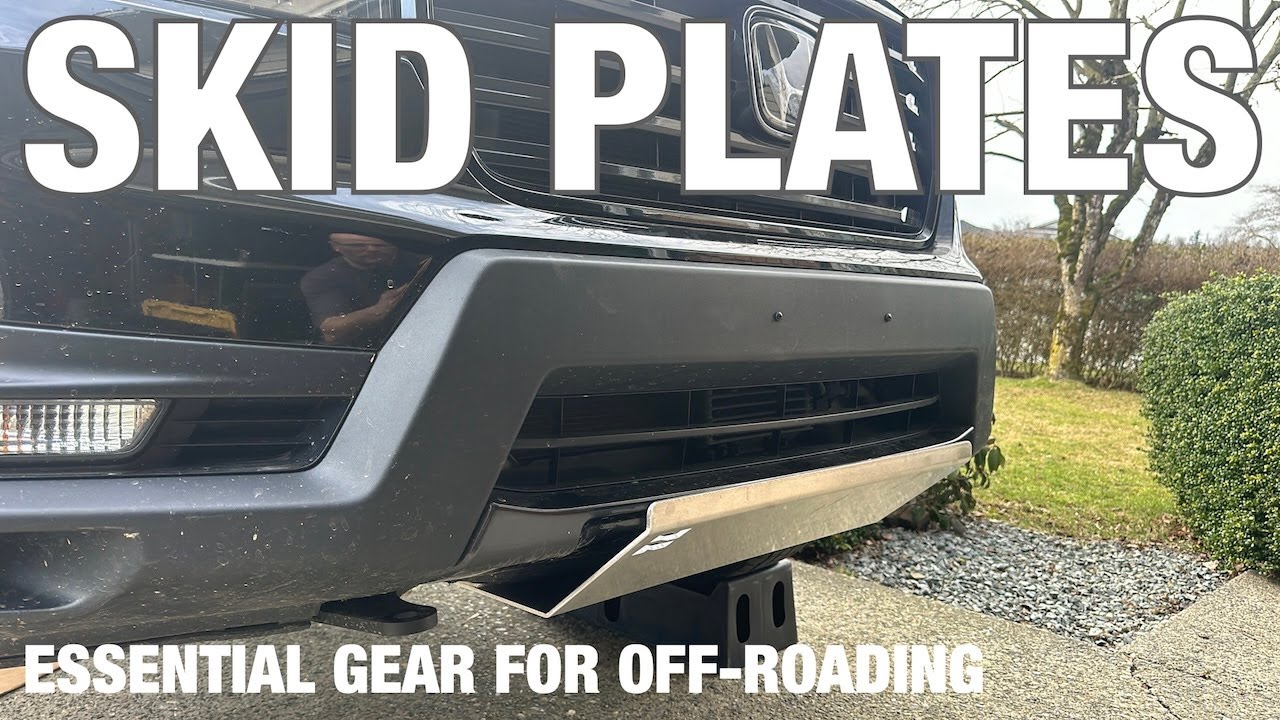 Installing skid plates on a lifted Honda Ridgeline.  DO NOT wheel a Honda without skid plates!
