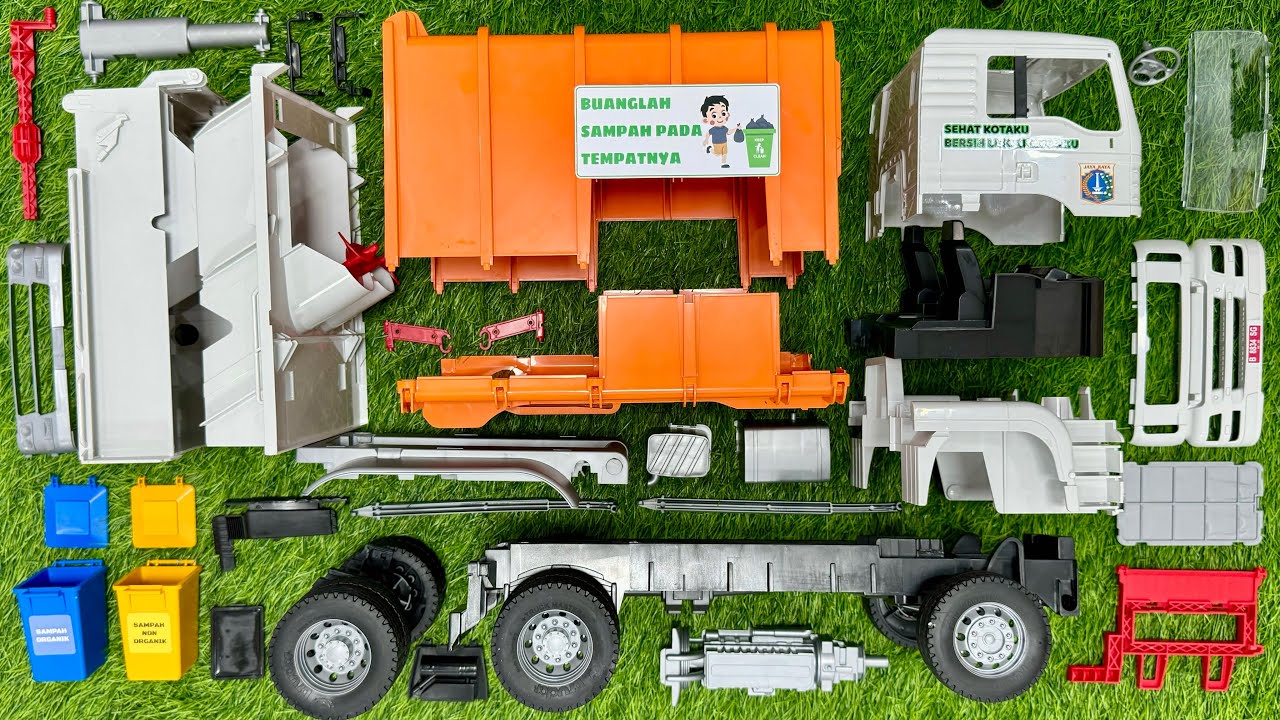 Merakit Truk Sampah Rusak