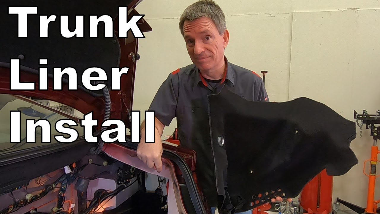 Installing the Right Inner Trunk Liner in an Aston Martin DB9