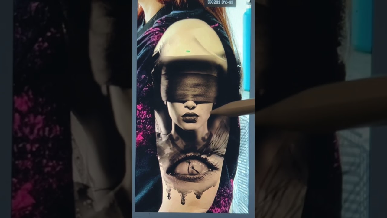 Upperarm custom design tattoo.   #portraittattoo #eyetattoo #upperarmtattoo #blindfold #customdesign