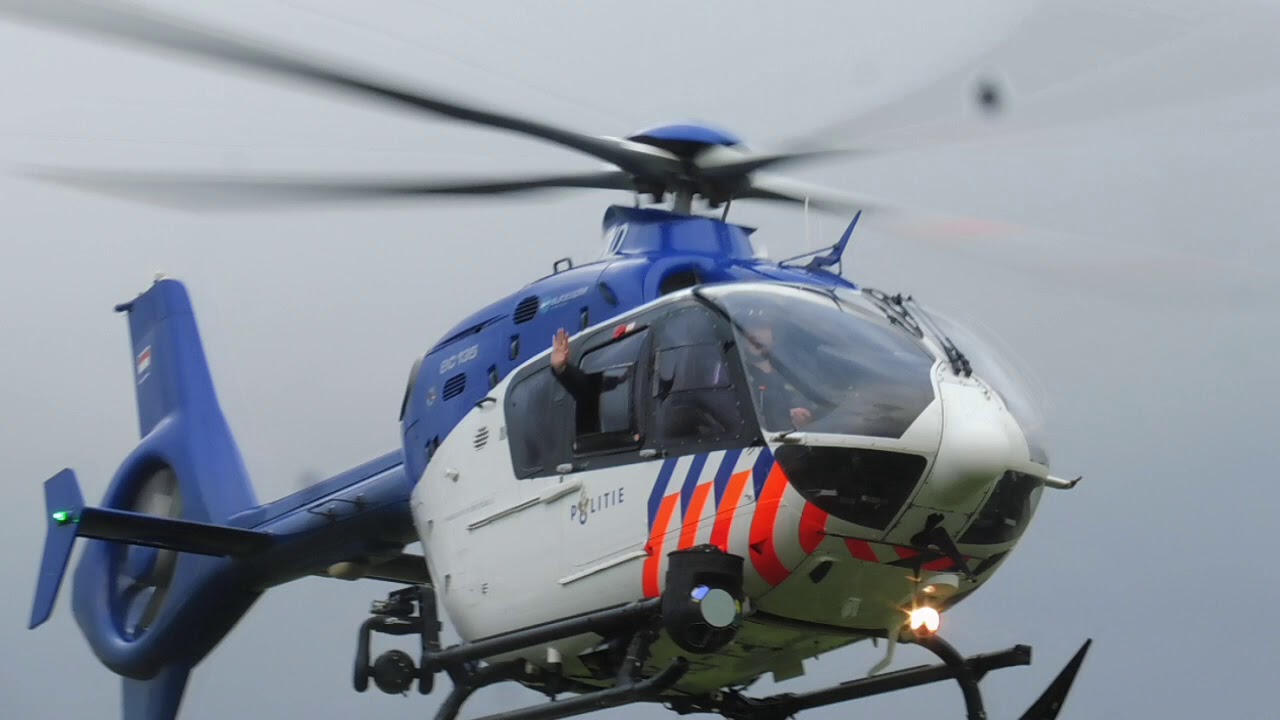EC-135 Police chopper PH-PXD POLICE-04 land with a small greeting at rotterdam airport